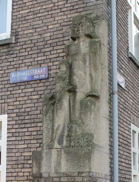 Afbeelding uit: december 2013. Op de hoek van de Raphaëlstraat met de Apollolaan bevindt zich dit beeld van Theo Vos. Het toont een vrouw met naast haar kinderen die de hand ophouden. Op de sokkel staat 'Rafael'.