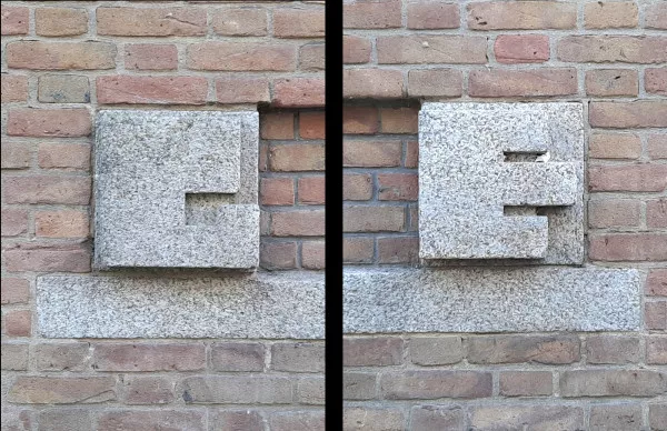 Afbeelding uit: oktober 2020. Collage van de letters G en E, aangebracht aan weerszijden van de deuren. Het zijn de initialen van Gemeente-Electriciteitswerken.