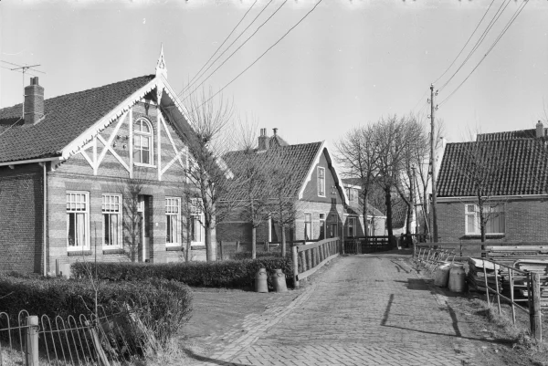 Afbeelding uit: februari 1965. Het huis in het midden is nummer 31. Bron: RCE Amersfoort, doc.nr 95.892.
